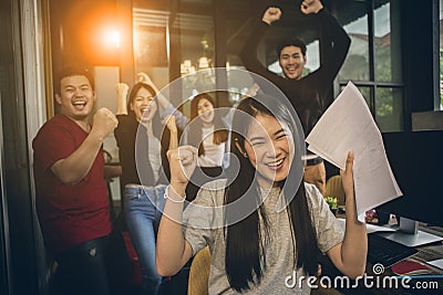 Asian younger freelance teamwork job successfull happiness emot Stock Photo