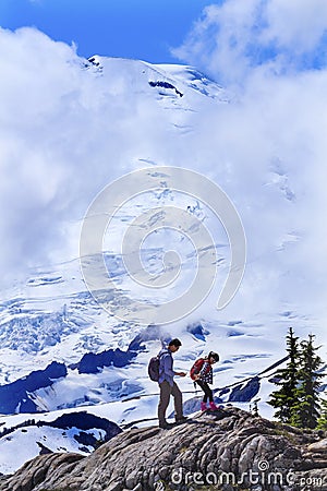 Asians Hiking Mount Baker Under Clouds from Artist Point Washing Editorial Stock Photo