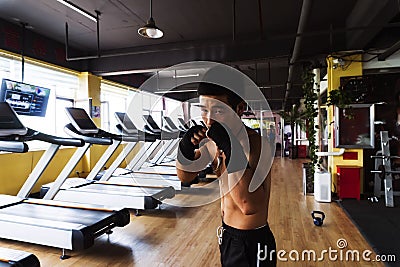 Asians Man Boxing At Gym Stock Photo