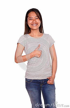 Asiatic smiling young woman showing you ok sign Stock Photo