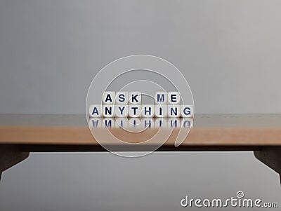 Ask me anything on wood table Stock Photo