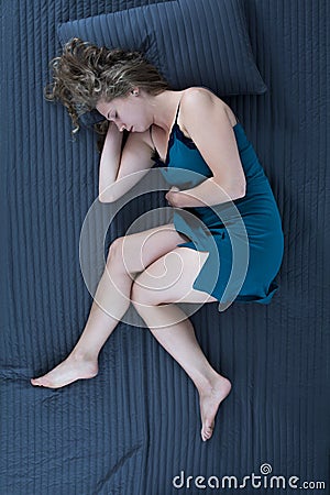 Asleep woman in nightgown Stock Photo