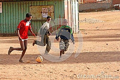 Eritrean kids play football on the outskirts of Asmara, Eritrea. Editorial Stock Photo