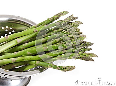 Asparagus in a colander Stock Photo