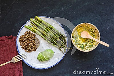 Asparagus with lentils and avocado Stock Photo