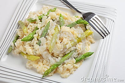 Asparagus risotto with fork Stock Photo