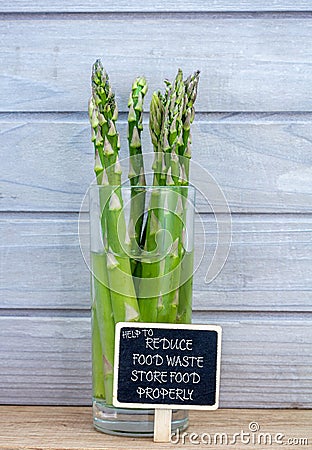 Asparagus stored in water in glass to preserve it longer, help to reduce food waste Stock Photo