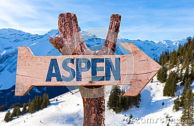 Aspen wooden sign with alps background Stock Photo