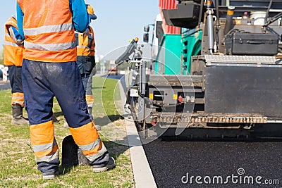 Asphalt pavement construction works Stock Photo