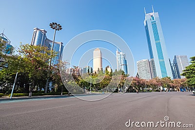 Asphalt pavement with modern urban background Stock Photo