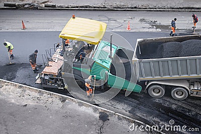 Asphalt paver machine or paver finisher Editorial Stock Photo