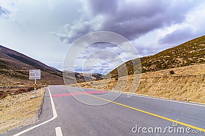 Asphalt road High way Empty curved road clouds, sky and mountain Stock Photo