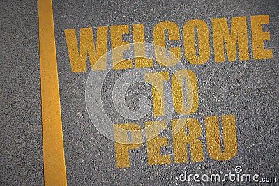asphalt road with text welcome to peru near yellow line. Stock Photo