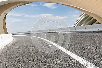 Asphalt roads and abstraction of modern architecture Stock Photo