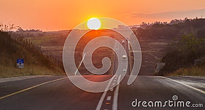 Asphalt tar road at sunset in South Africa Stock Photo