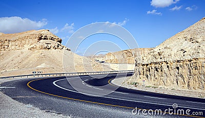 Asphalt winding road in the Judean desert among the Eilat mountains Stock Photo