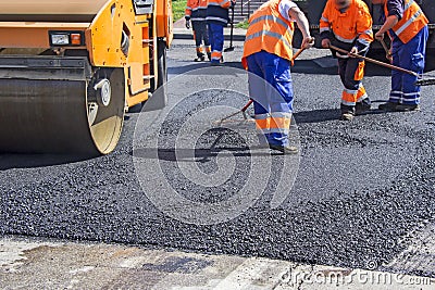 Asphalting city roads Stock Photo