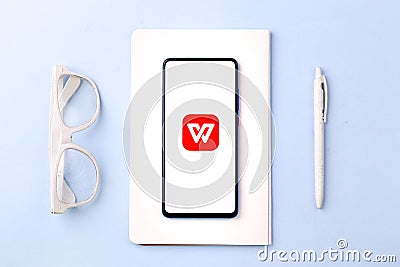 Assam, india - April 10, 2021 : WPS Office logo on phone screen stock image. Editorial Stock Photo