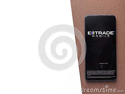 Assam, india - Augest 2, 2020 : Extrade/E*trade financial corporation logo displayed on a smartphone. Editorial Stock Photo