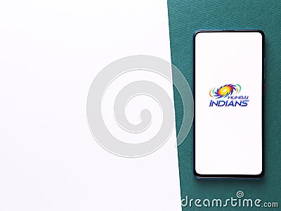 Assam, india - August 27, 2020 : Mumbai Indians logo on phone screen stock image. Editorial Stock Photo