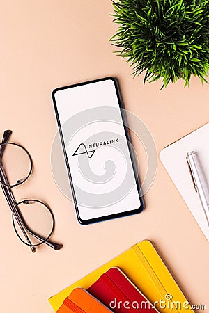 Assam, india - December 20, 2020 : Neuralink logo on phone screen stock image. Editorial Stock Photo