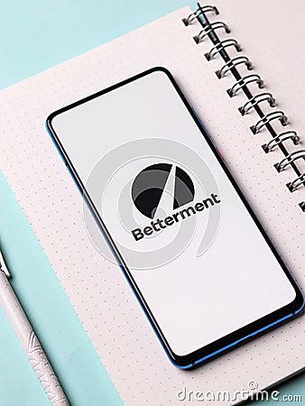 Assam, india - February 19, 2021 : Betterment logo on phone screen stock image. Editorial Stock Photo