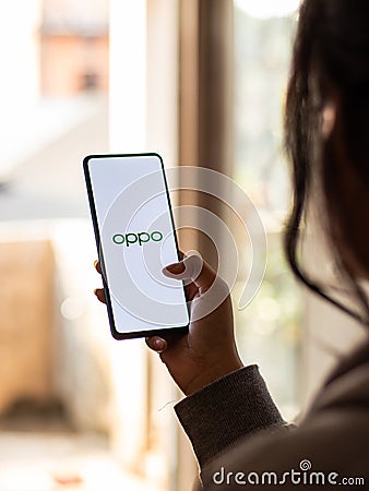 Assam, india - January 15, 2020 : Oppo logo on phone screen stock image. Editorial Stock Photo