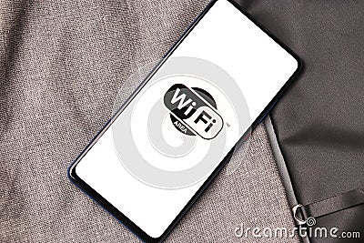 Assam, india - January 15, 2020 : Wifi logo on phone screen stock image. Editorial Stock Photo