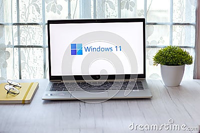 Assam, india - June 17, 2021 : Windows 11 logo on laptop screen stock image. Editorial Stock Photo