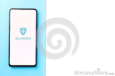 Assam, india - May 04, 2021 : ALHOSN UAE logo on phone screen stock image. Editorial Stock Photo