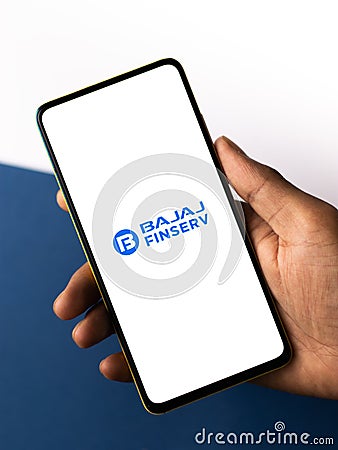 Assam, india - September 24, 2020 : Bajaj finserv logo on phone screen stock image. Editorial Stock Photo