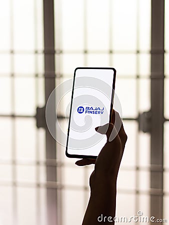 Assam, india - September 24, 2020 : Bajaj finserv logo on phone screen stock image. Editorial Stock Photo