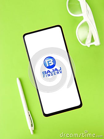 Assam, india - September 24, 2020 : Bajaj finserv logo on phone screen stock image. Editorial Stock Photo