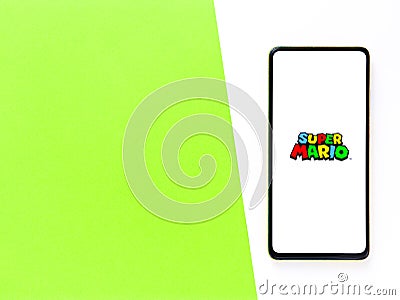 Assam, india - September 24, 2020 : Super Mario logo on phone screen stock image. Editorial Stock Photo