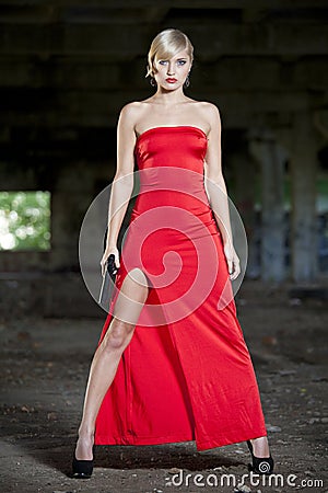 Assassin in red dress Stock Photo