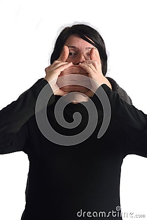 Assaulting and silencing a woman Stock Photo