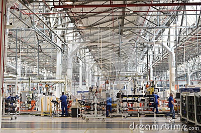 Assembly line of auto engine Editorial Stock Photo