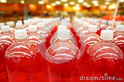 Assembly line bottle red liquid rows lines Stock Photo