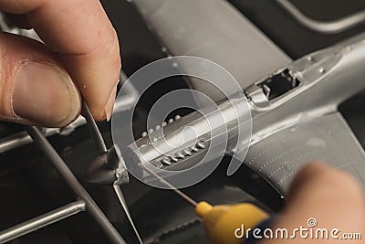 Assembly of plastic model aeroplane parts Stock Photo