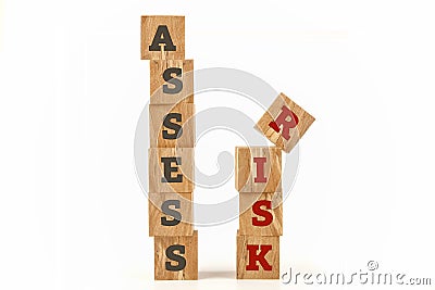 Assess Risk word written on cube shape. Stock Photo