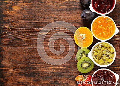 Assorted berries and fruit jams. Homemade canning. Stock Photo