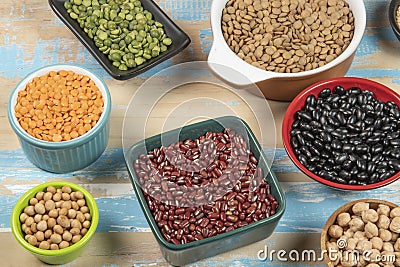 assorted bowls with raw grain and seeds top view Stock Photo