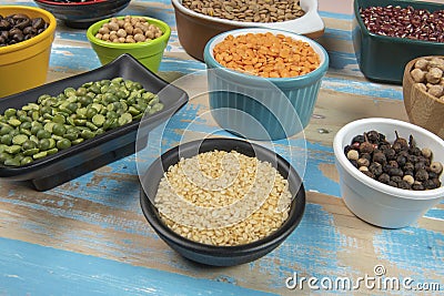 assorted bowls with raw grain and seeds top view Stock Photo