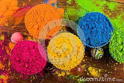 Assorted bright podwer color samples on dark background Stock Photo