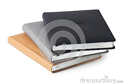 Assorted business diaries isolated on white Stock Photo