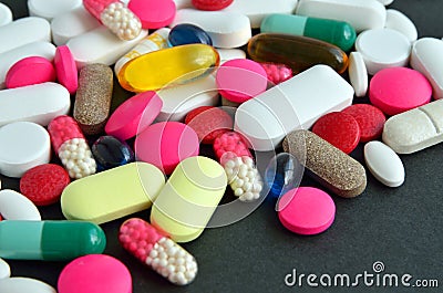 Assorted colored pills Stock Photo