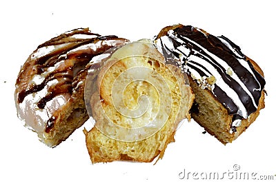 Assorted Danish pastry with brown dark chocolate, white chocolate, caramel sauce and pastry cream, sweet bakery dough baked in the Stock Photo