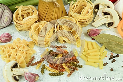 Assorted different types of pasta on the table Stock Photo