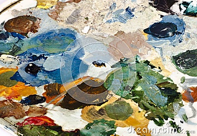 Assorted dry colors on a painters palette Stock Photo