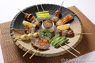Assorted Japanese Kushiyaki, Skewered and Grilled Meat Stock Photo